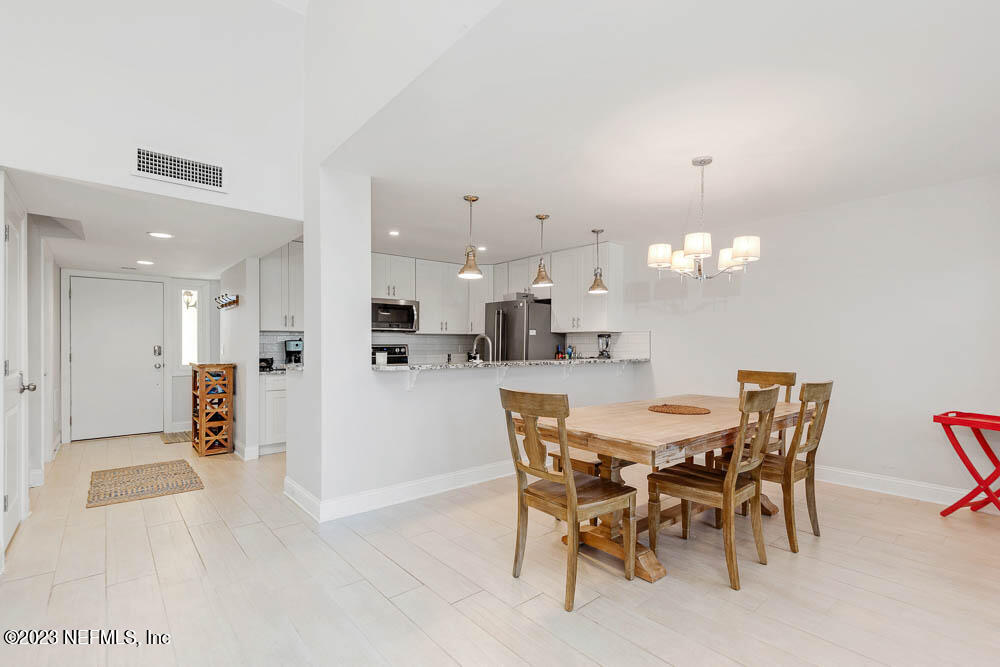 10 Cove Road Ponte Vedra Beach, FL 32082 - Photo 5 of 31 a view of a dining area with furniture