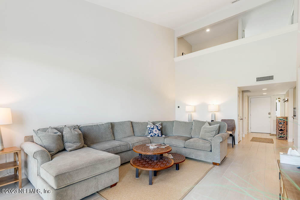 10 Cove Road Ponte Vedra Beach, FL 32082 - Photo 9 of 31 a living room with couches and a coffee table