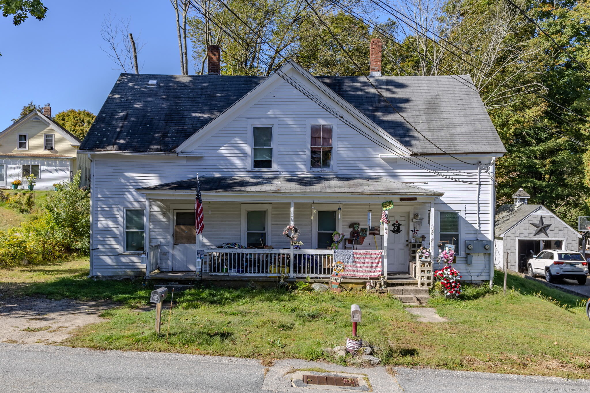 a view of a house with garden and plants
