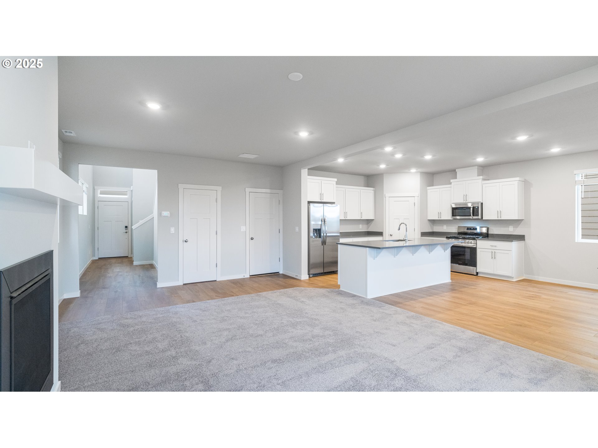 996 Legacy Lane Eugene, OR 97402 - Photo 27 of 37 a kitchen with a refrigerator and a sink