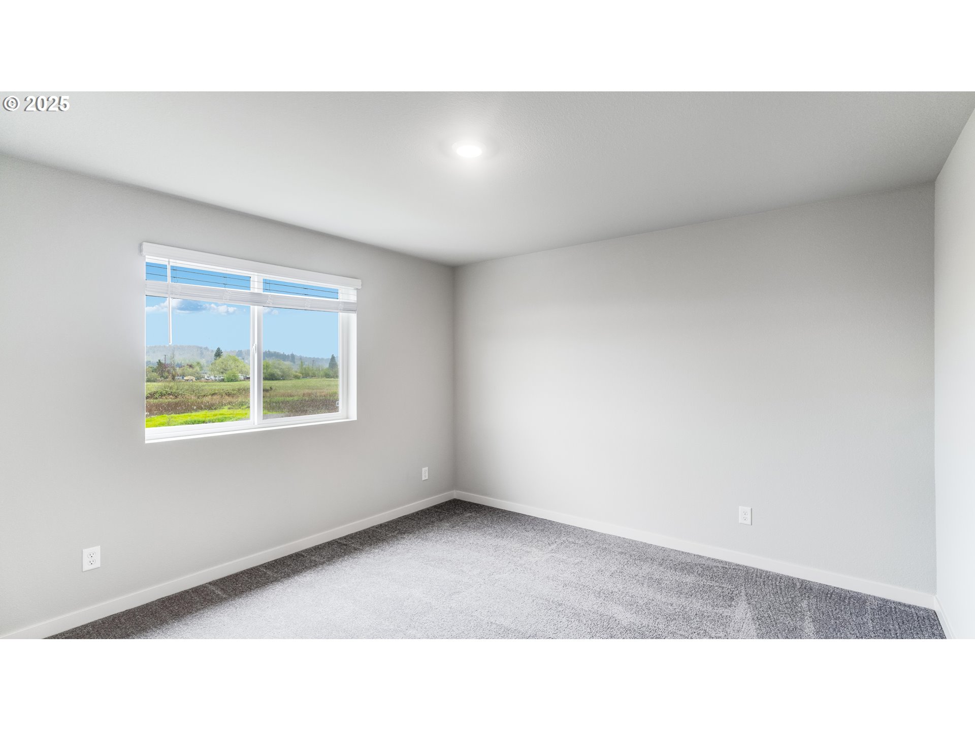996 Legacy Lane Eugene, OR 97402 - Photo 36 of 37 a open hall with a wooden floor and a window