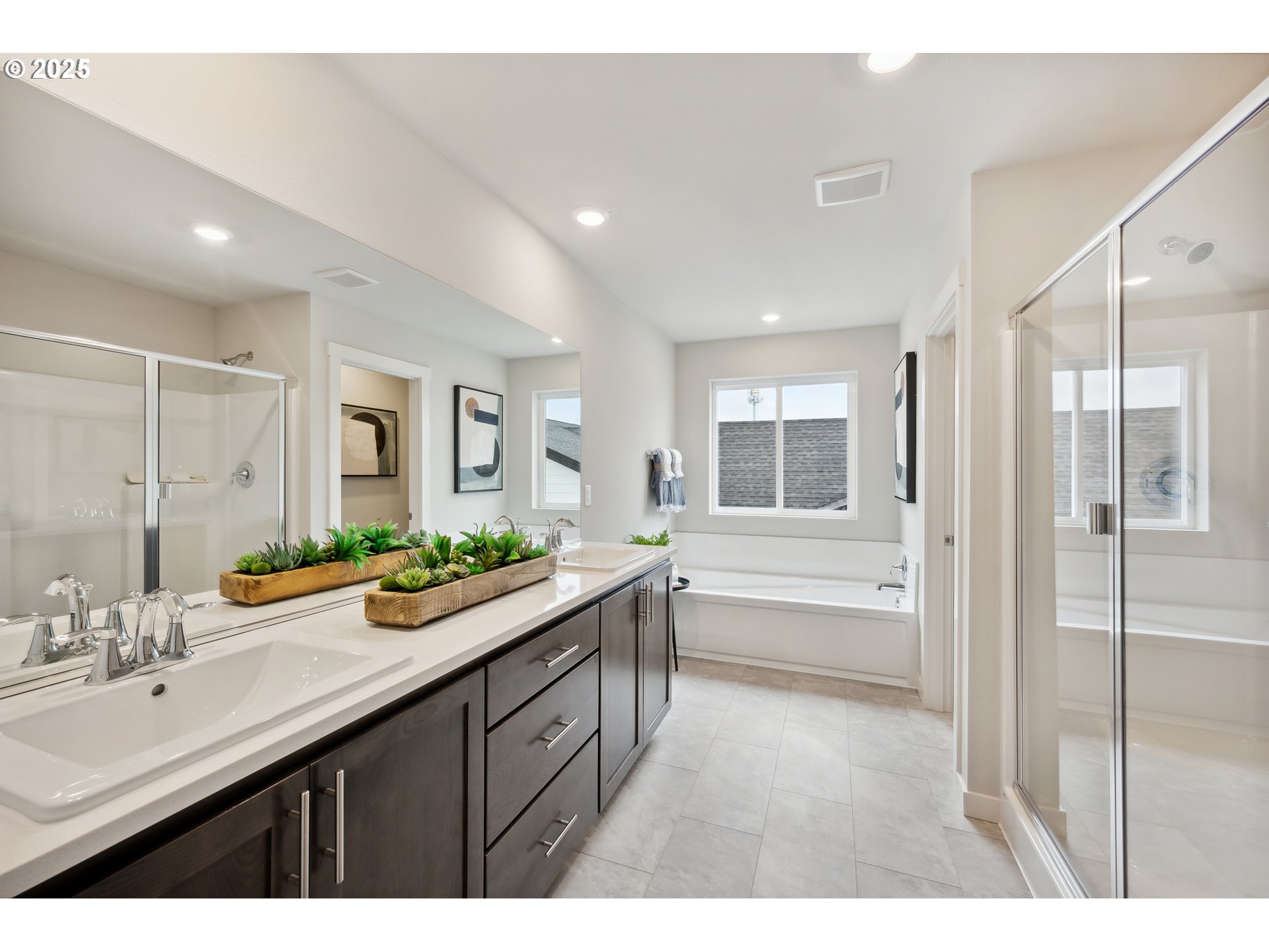 996 Legacy Lane Eugene, OR 97402 - Photo 10 of 37 a bathroom with a sink double vanity granite tub shower and a mirror