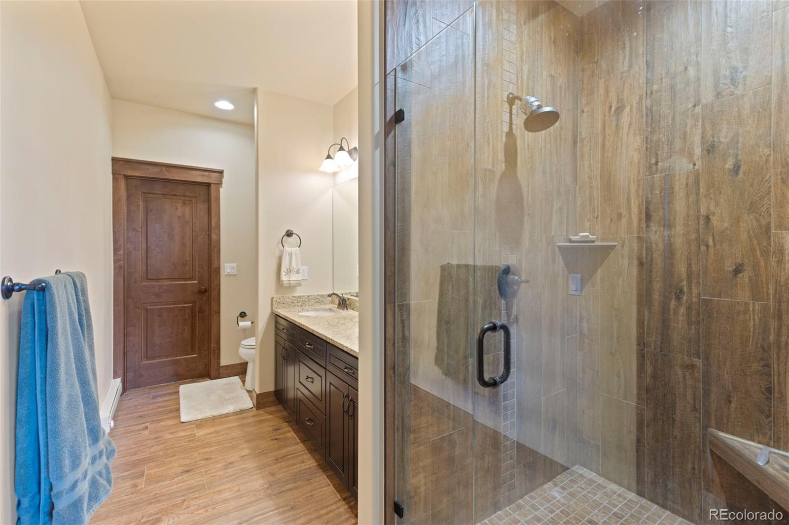 799 Independence Road Keystone, CO 80435 - Photo 24 of 44 a en suite bathroom with a shower and a sink