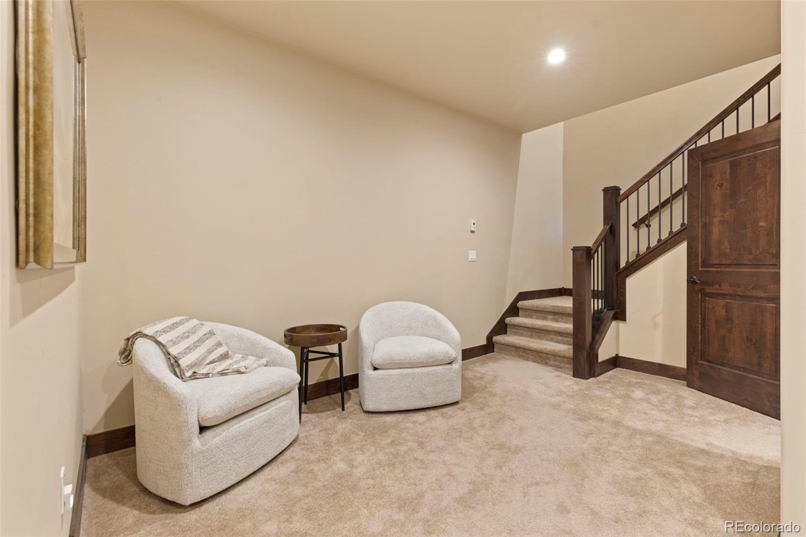 799 Independence Road Keystone, CO 80435 - Photo 34 of 44 a room with stairs and a couch