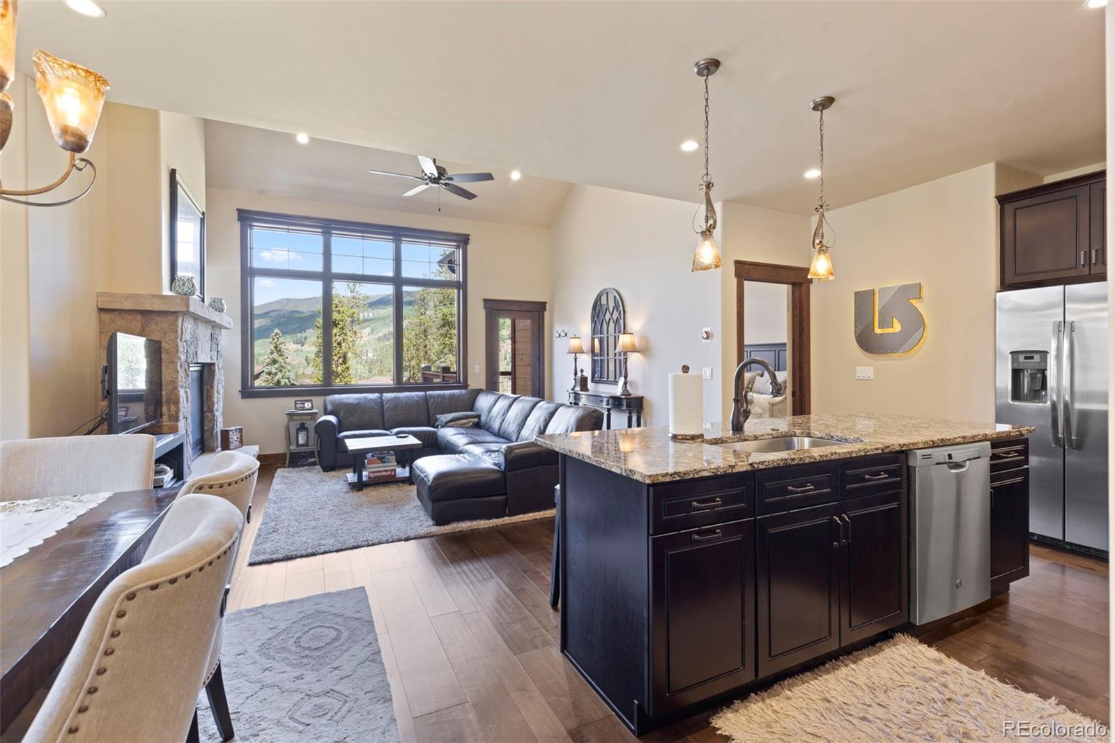 799 Independence Road Keystone, CO 80435 - Photo 4 of 44 a living room with granite countertop furniture a large window and a sink