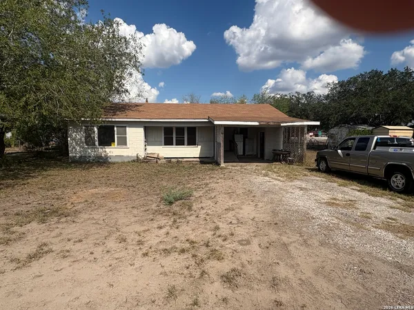 a view of a house with a patio