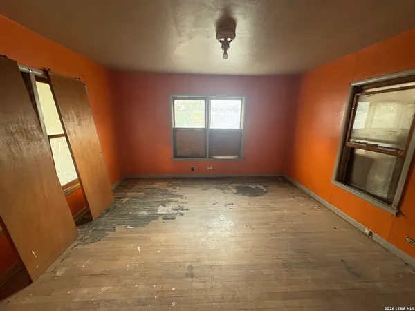 an empty room with windows
