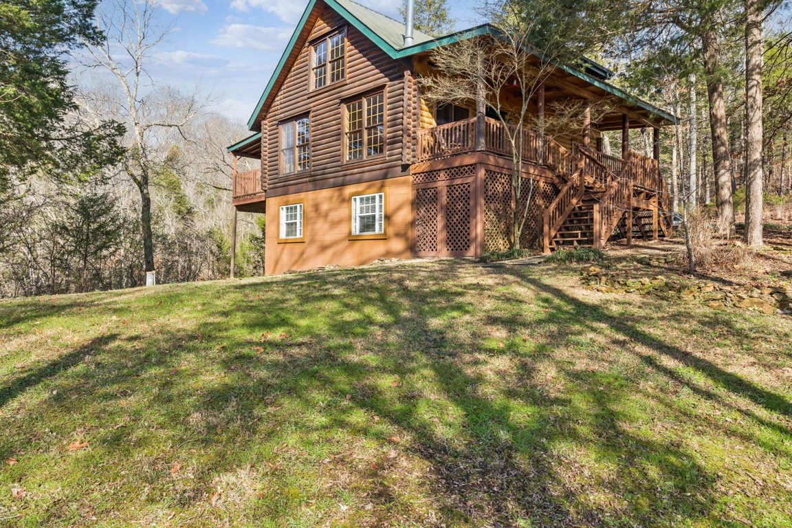 1140 Leatherwood Road White Bluff, TN 37187 - Photo 2 of 29 a view of a house with a yard