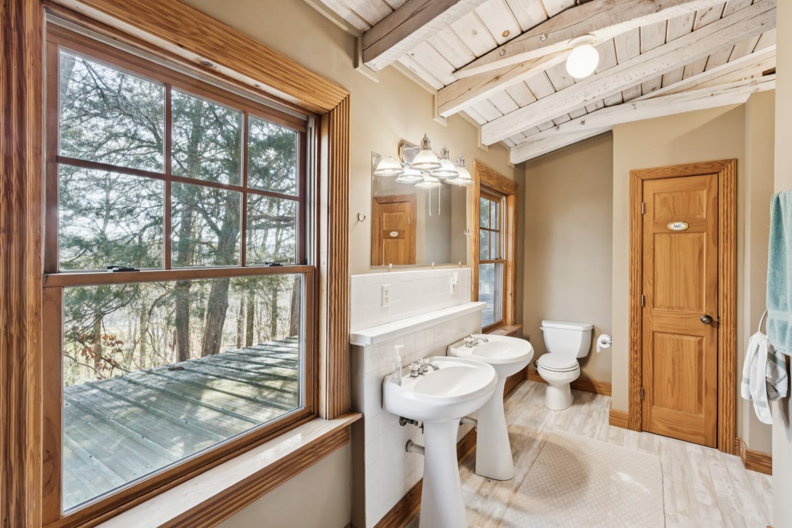 1140 Leatherwood Road White Bluff, TN 37187 - Photo 21 of 29 a bathroom with a sink a toilet and shower