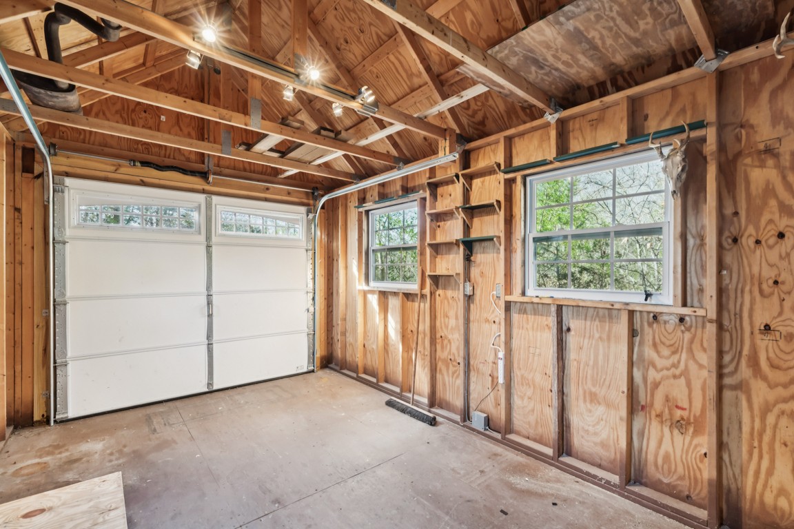 1140 Leatherwood Road White Bluff, TN 37187 - Photo 27 of 29 a view of a room with wooden walls