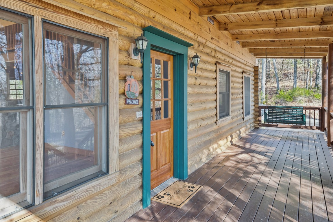 1140 Leatherwood Road White Bluff, TN 37187 - Photo 3 of 29 a view of an entryway with wooden floor and door