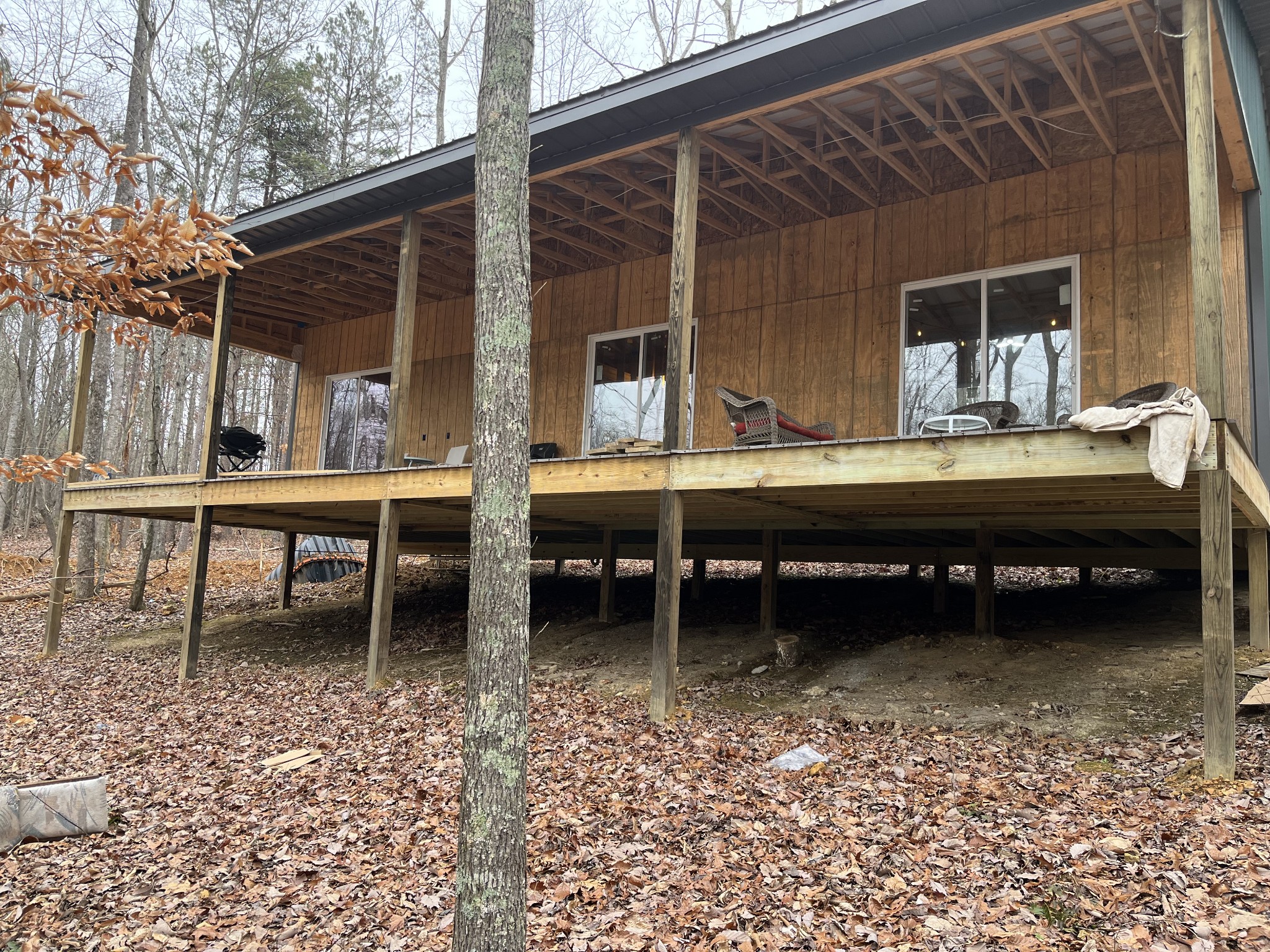 908 Walker Road Hampshire, TN 38461 - Photo 14 of 23 a backyard of a house with table and chairs