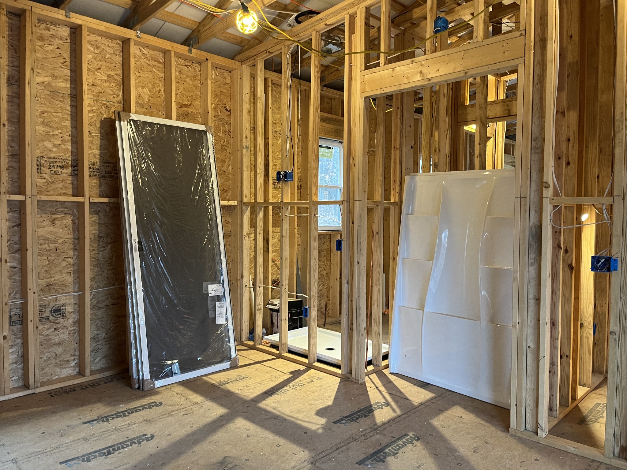 908 Walker Road Hampshire, TN 38461 - Photo 5 of 23 a view of a bathroom with a glass door shower and sink