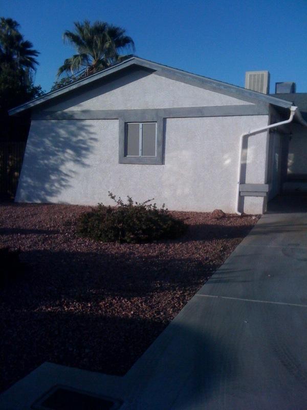 8402 West Osborn Road Phoenix, AZ 85037 - Photo 1 of 9 front view of double garage