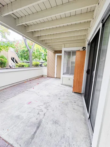 a view of a hallway with a large window