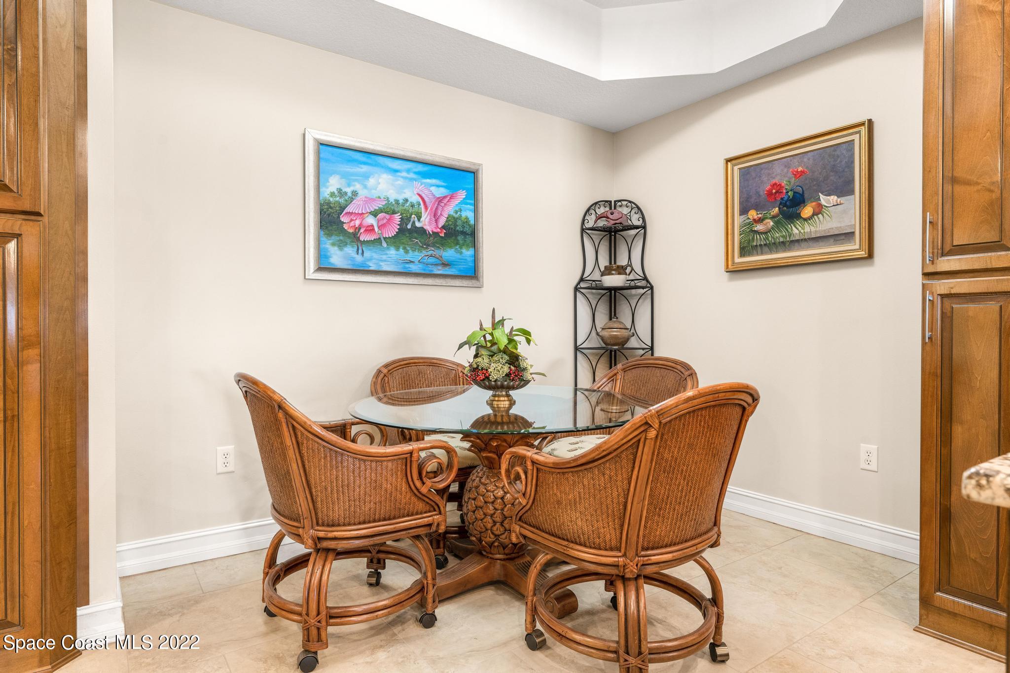 29 Riverside Drive, Unit 302 Cocoa, FL 32922 - Photo 14 of 56 a view of a dining room with furniture window and wooden floor