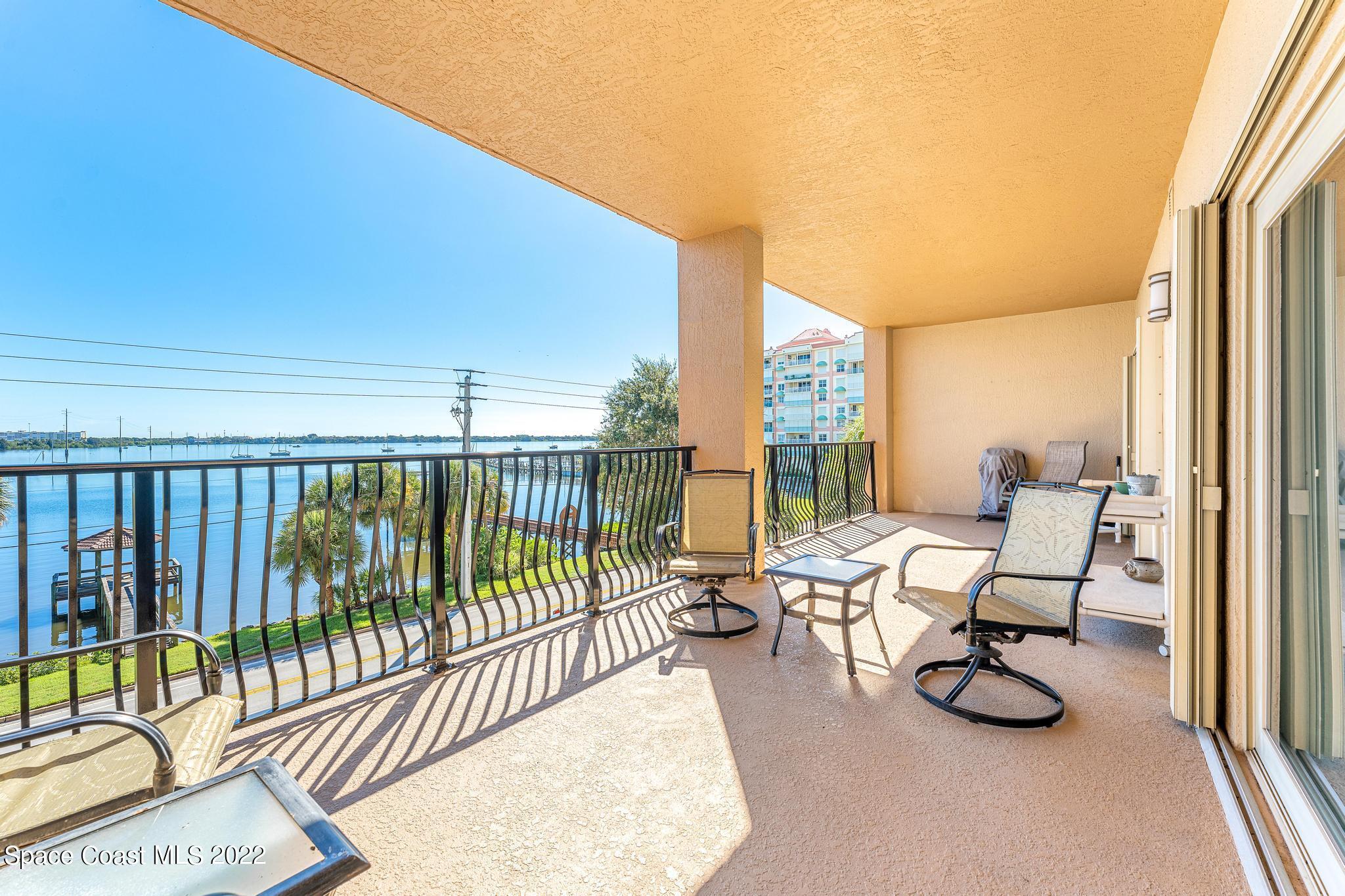 29 Riverside Drive, Unit 302 Cocoa, FL 32922 - Photo 34 of 56 a view of balcony with furniture and floor to ceiling window