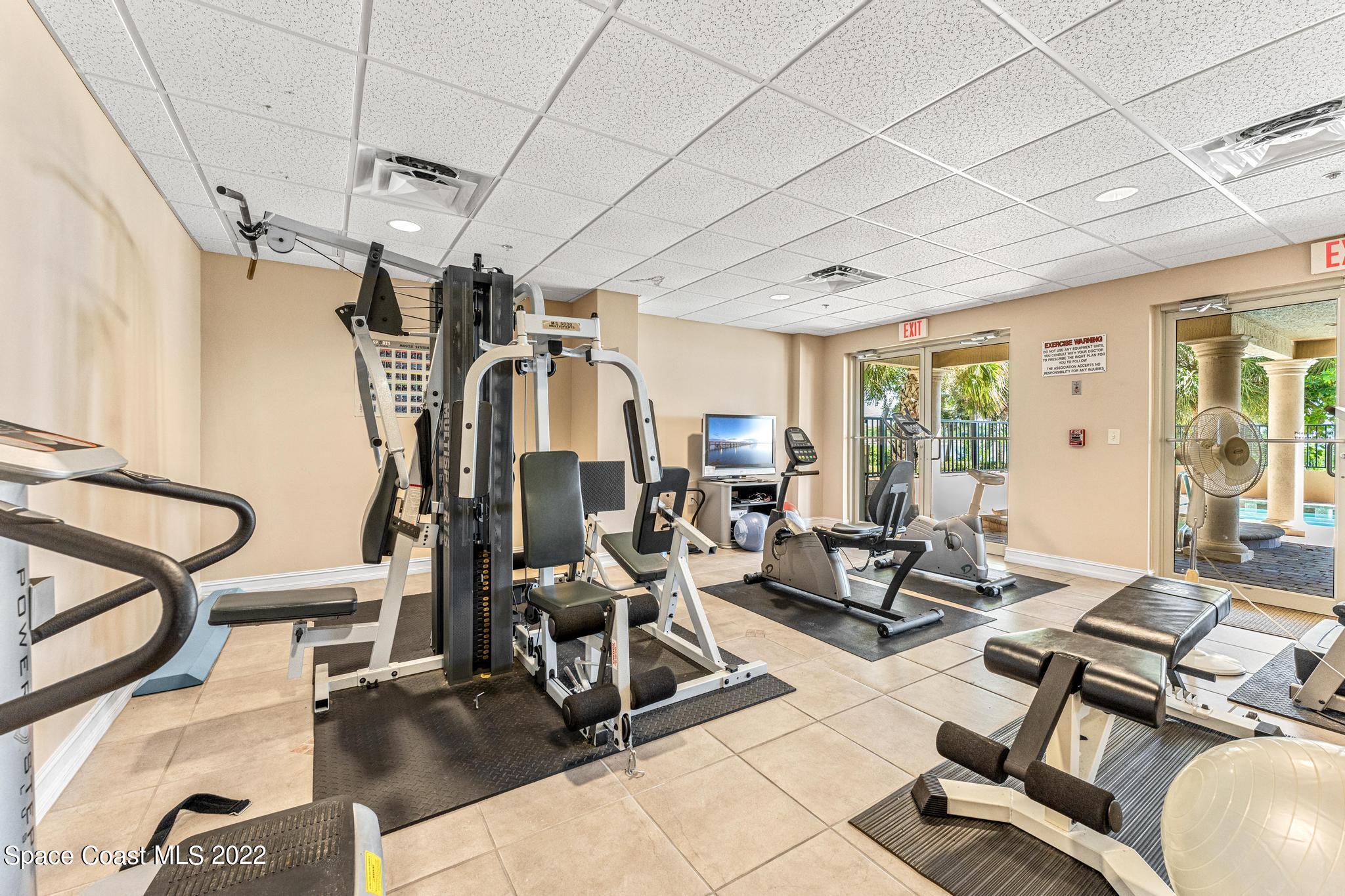 29 Riverside Drive, Unit 302 Cocoa, FL 32922 - Photo 40 of 56 a view of a livingroom with furniture and a table