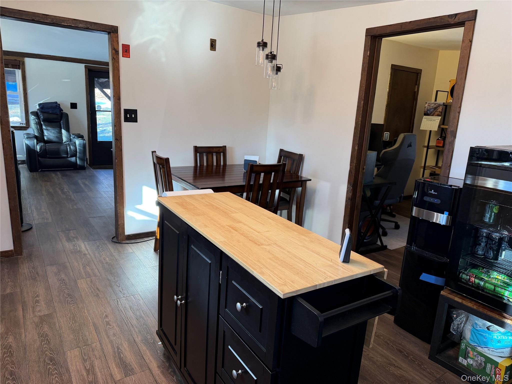 302 Lake Road New Windsor, NY 12553 - Photo 7 of 24 a room with a table chairs and wooden floor