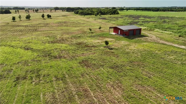 a view of a lake with outdoor space