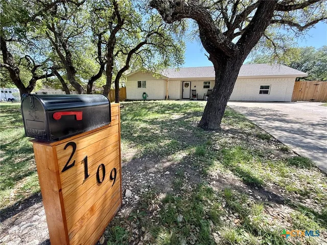 a view of outdoor space with sign board