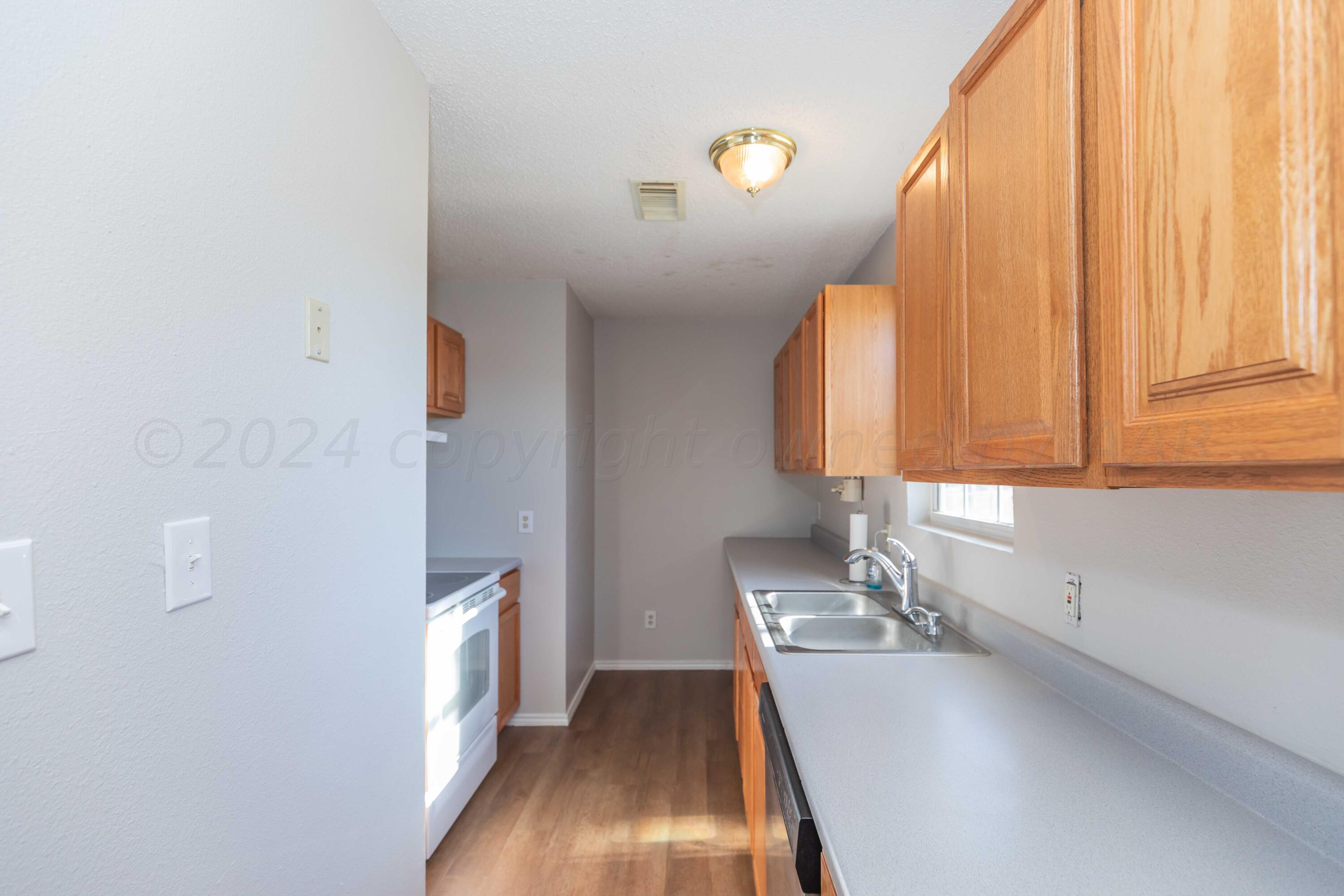 111 Rimrock Trail Amarillo, TX 79108 - Photo 12 of 39 KITCHEN VIEW 1