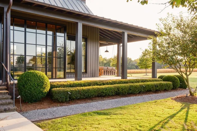 a kitchen with stainless steel appliances a refrigerator and cabinets
