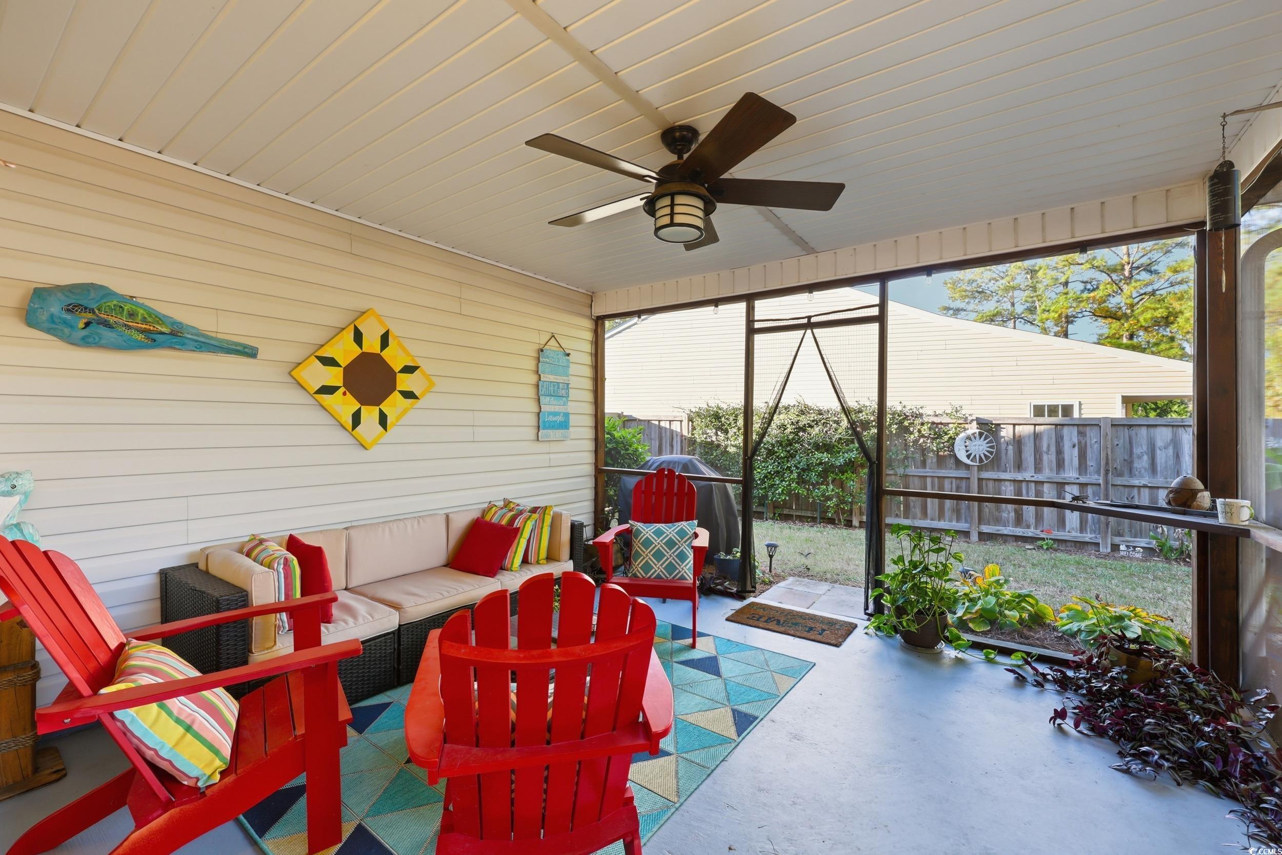 236 Devonbrook Place Longs, SC 29568 - Photo 32 of 40 Sunroom featuring ceiling fan, an outdoor hangout area, and a patio
