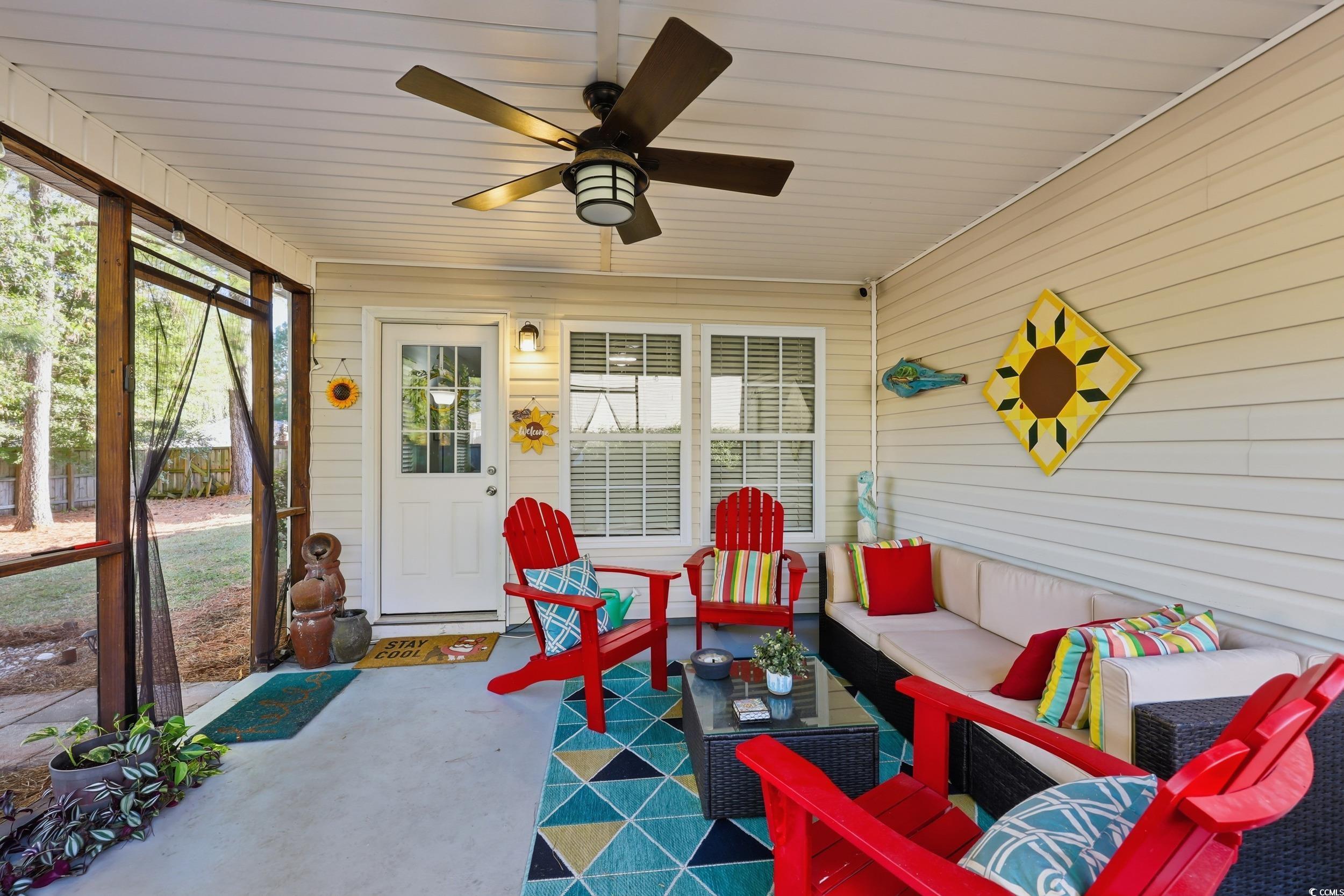 236 Devonbrook Place Longs, SC 29568 - Photo 33 of 40 Sunroom featuring a ceiling fan and outdoor lounge area