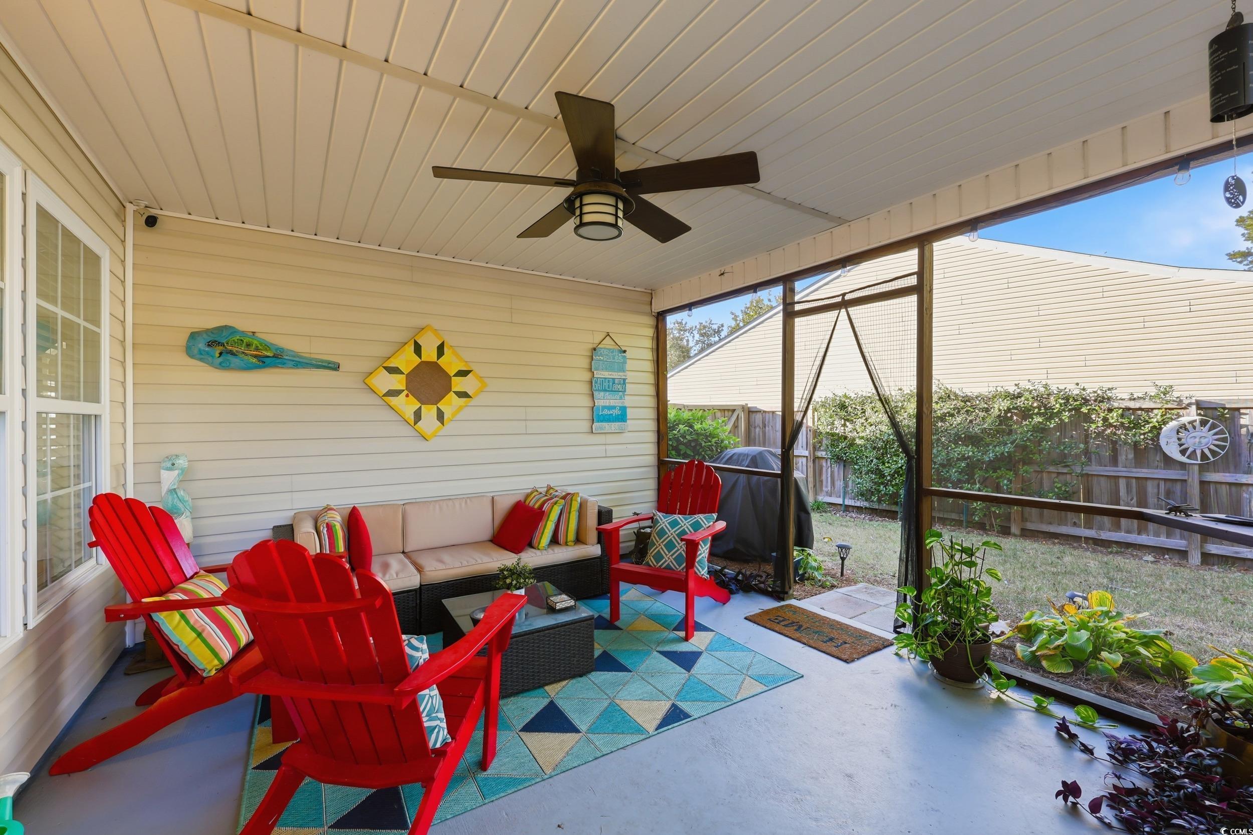 236 Devonbrook Place Longs, SC 29568 - Photo 34 of 40 Sunroom featuring ceiling fan, an outdoor living space, and a patio area