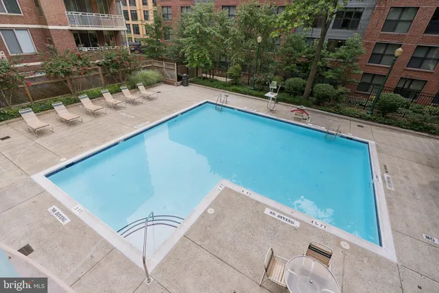 a view of a backyard with sitting area