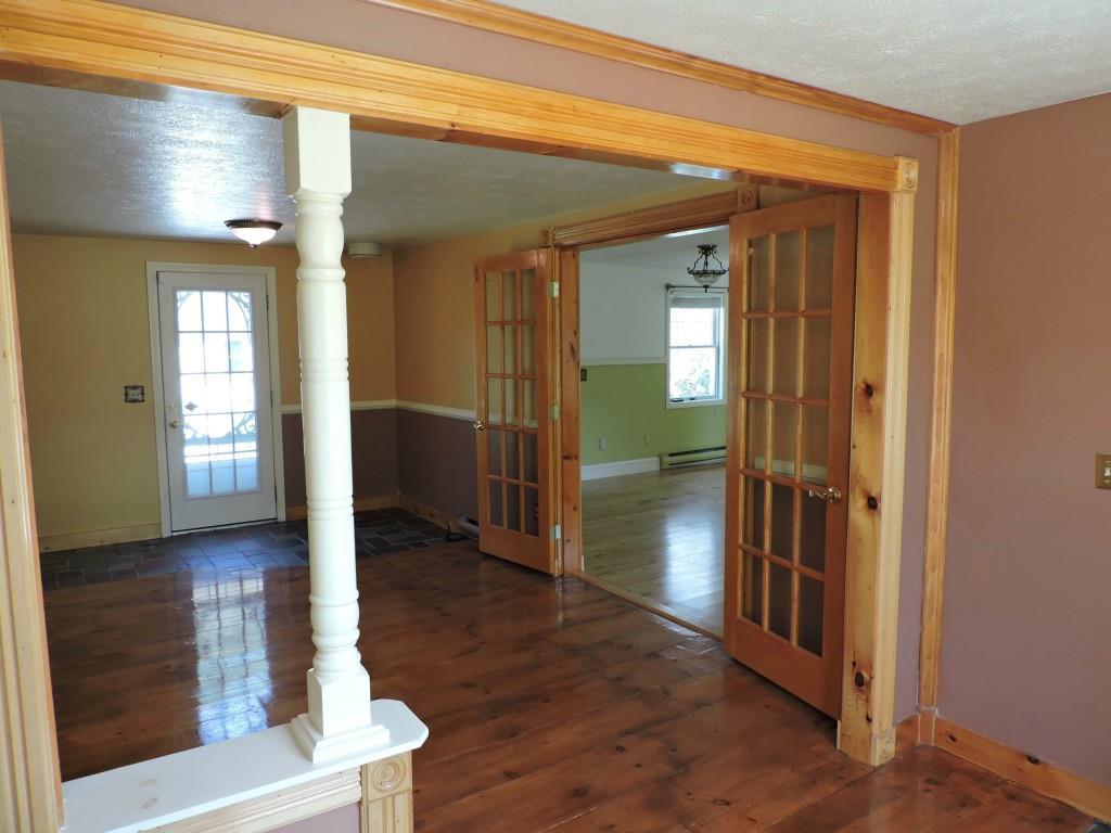 61 South Skillings Road Arundel, ME 04046 - Photo 3 of 27 Gleaming hardwood floors and french...