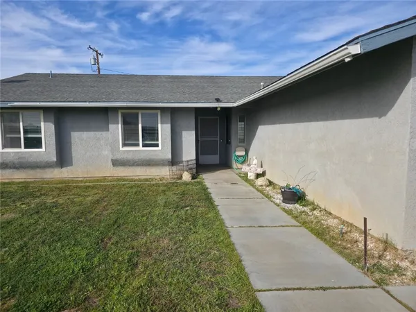 a front view of house with yard