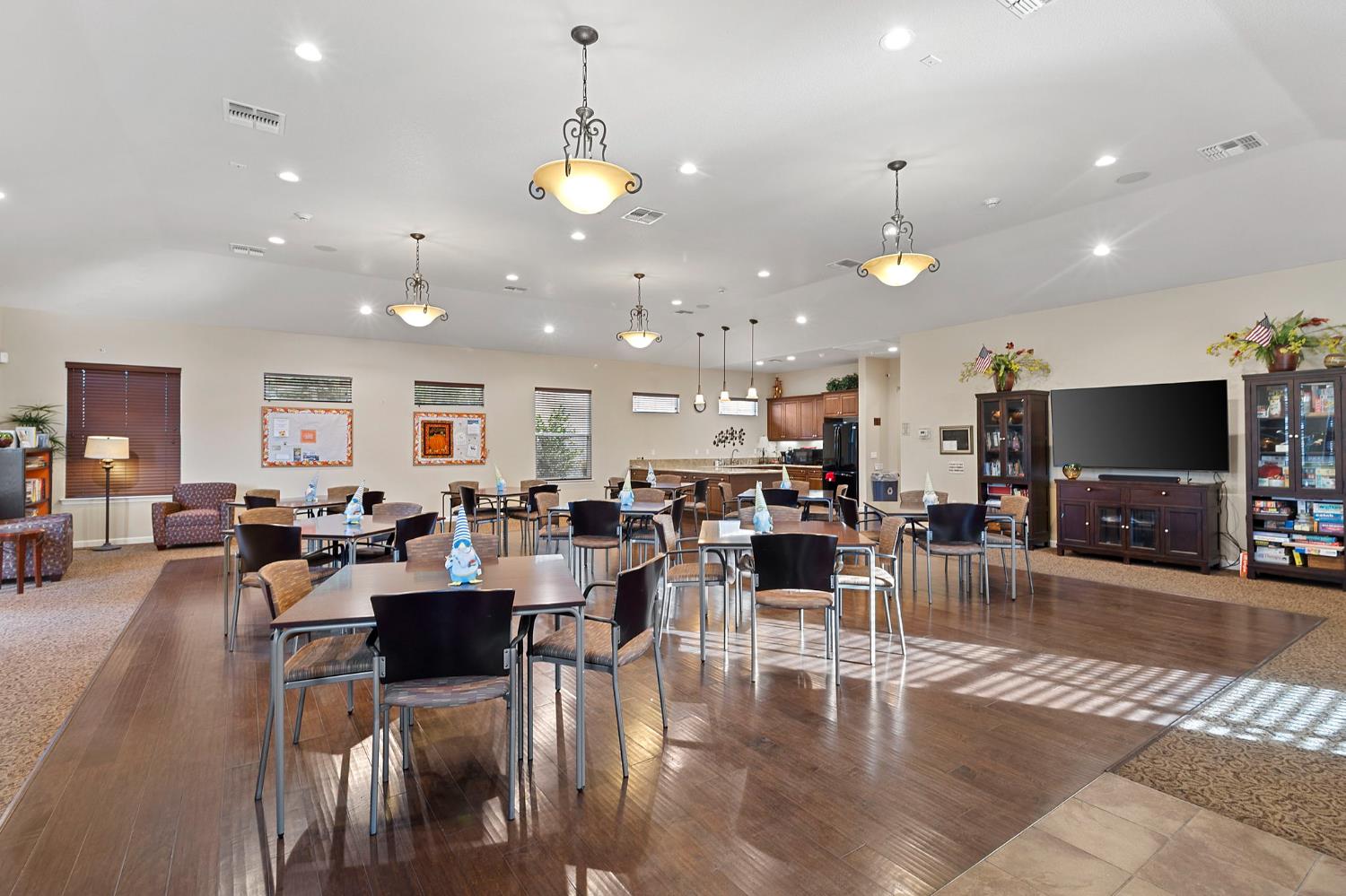 7525 Eldred Way Sacramento, CA 95829 - Photo 25 of 32 a living room with lots of furniture and a flat screen tv