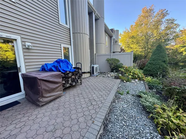 a view of a chairs in front of house