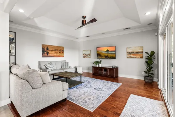a living room with furniture and view of living room