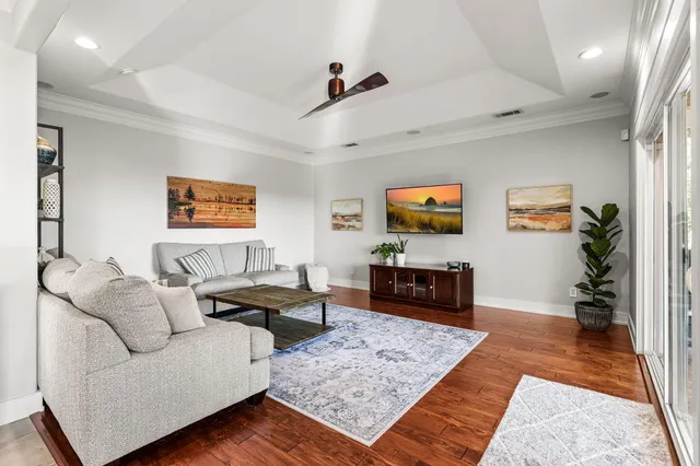a living room with furniture and view of living room