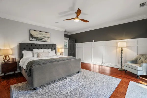 a bedroom with a bed next to a window with the outer view