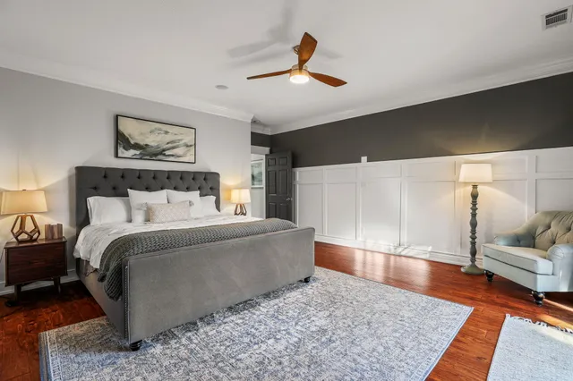 a bedroom with a bed next to a window with the outer view