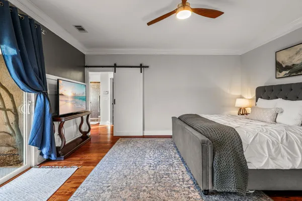 a bathroom with a shower and a sink