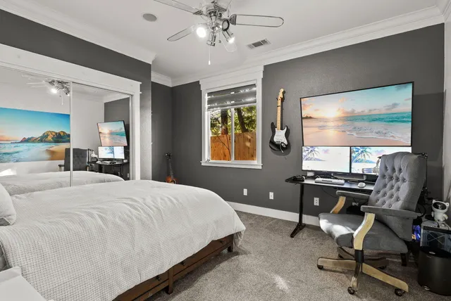 a bathroom with a sink toilet and a mirror