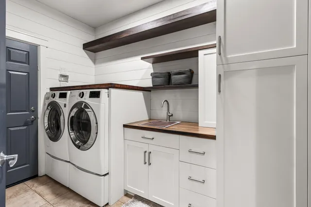 a view of backyard with patio