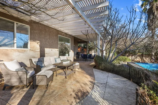 a view of a building with sitting area