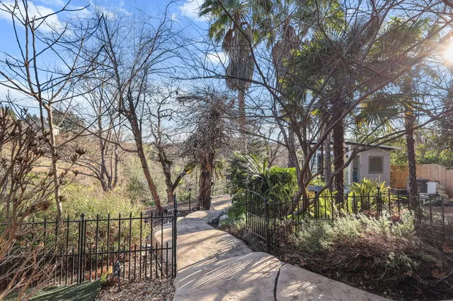a backyard of a house with lots of green space