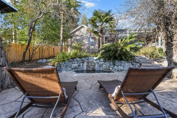 a backyard of a house with lots of green space