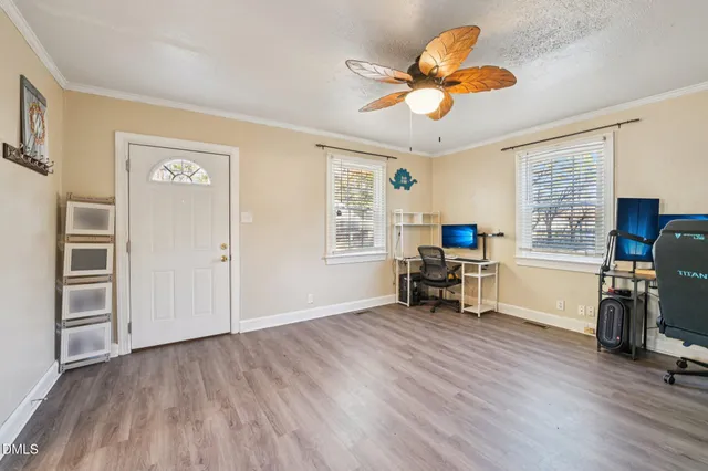 a view of livingroom with furniture and a flat screen tv
