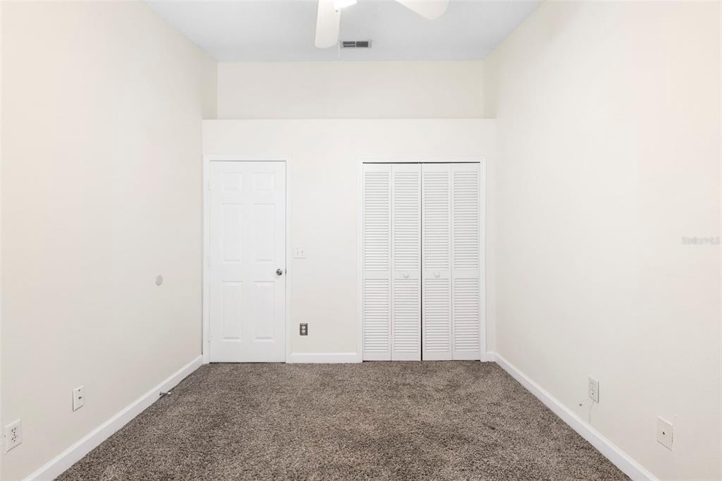 949 Tillery Way, Unit 101 Orlando, FL 32828 - Photo 17 of 38 a view of an empty room