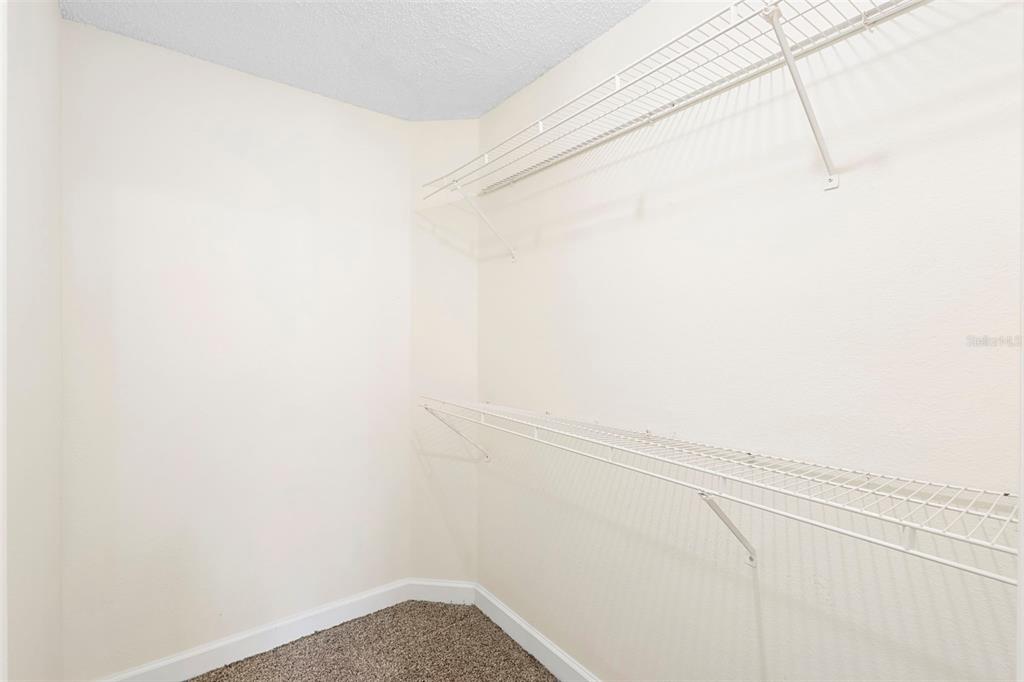 949 Tillery Way, Unit 101 Orlando, FL 32828 - Photo 25 of 38 a view of small space with empty racks