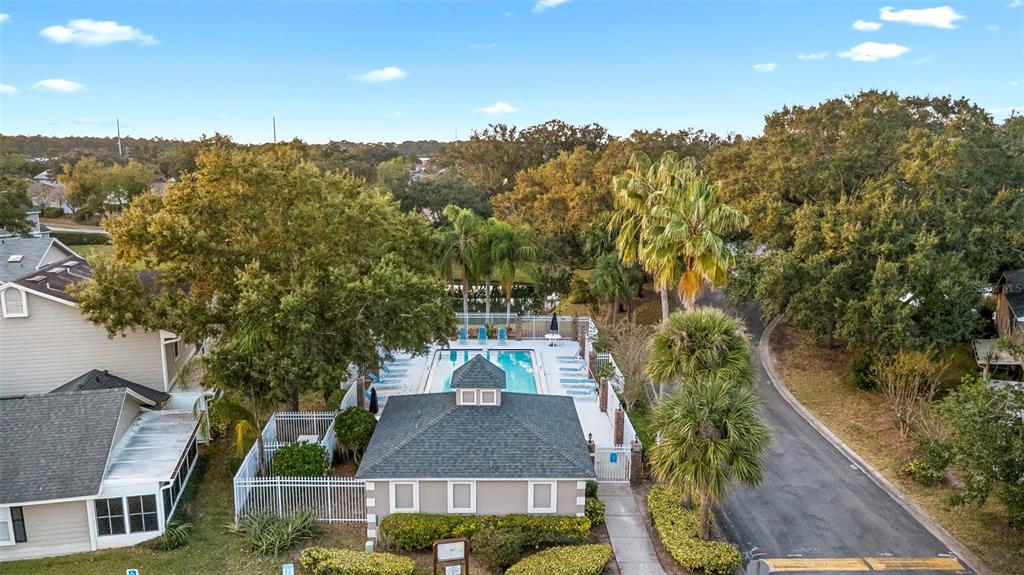 949 Tillery Way, Unit 101 Orlando, FL 32828 - Photo 33 of 38 aerial view of a house with a yard