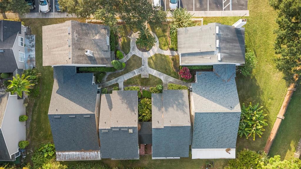 949 Tillery Way, Unit 101 Orlando, FL 32828 - Photo 34 of 38 an aerial view of a house with swimming pool